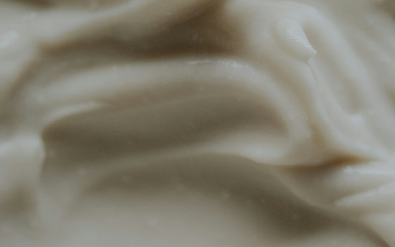 Macro texture of a thick white moisturising cream